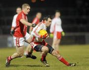 13 March 2010; Cathal McCarron, Tyrone, in action against Daniel Goulding, Cork. Allianz GAA Football National League, Division 1, Round 4, Tyrone v Cork, Healy Park, Omagh, Co. Tyrone. Picture credit: Oliver McVeigh / SPORTSFILE