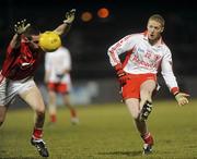 13 March 2010; Colm McCullagh, Tyrone, in action against Noel O'Leary, Cork. Allianz GAA Football National League, Division 1, Round 4, Tyrone v Cork, Healy Park, Omagh, Co. Tyrone. Picture credit: Oliver McVeigh / SPORTSFILE
