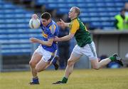 14 March 2010; Philip Austin, Tipperary, in action against Niall McKeigue, Meath. Allianz GAA Football National League, Division 2, Round 4, Tipperary v Meath, Semple Stadium, Thurles, Co. Tipperary. Picture credit: Brian Lawless / SPORTSFILE
