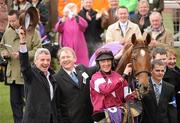 17 March 2010; Michael O'Leary, left, member of the winning connections of Weapon's Amnesty with trainer Charles Byrnes and jockey Davey Russell after winning the RSA Chase. Cheltenham Racing Festival - Wednesday. Prestbury Park, Cheltenham, Gloucestershire, England. Photo by Sportsfile