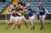 20 March 2016; Conor McDonald, Wexford, supported by team-mate Harry Kehoe, left, in action against Laois', from left, Matthew Whelan, Charles Dwyer and Ryan Mullaney. Allianz Hurling League, Division 1BA, Round 5, Laois v Wexford, O'Moore Park, Portlaoise, Co. Laois. Picture credit: Piaras Ó Mídheach / SPORTSFILE