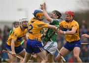 20 March 2016; Graeme Mulcahy, Limerick, in action against the Clare full back line of Patrick O'Connor, Oisin O'Brien and Paul Flanagan. Allianz Hurling League, Division 1B, Round 5, Clare v Limerick. Cusack Park, Ennis, Co. Clare. Picture credit: Diarmuid Greene / SPORTSFILE