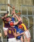 20 March 2016; Laois' Ryan Mullaney, behind, and Matthew Whelan contest a dropping ball with Wexford's, from left, Liam Óg McGovern, Lee Chin and Conor McDonald. Allianz Hurling League, Division 1BA, Round 5, Laois v Wexford, O'Moore Park, Portlaoise, Co. Laois. Picture credit: Piaras Ó Mídheach / SPORTSFILE