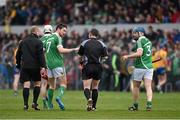 20 March 2016; Limerick's Seamus Hickey, left, and Richie McCarthy speak to referee Fergal Horgan as they leave the pitch a half time. Allianz Hurling League, Division 1B, Round 5, Clare v Limerick. Cusack Park, Ennis, Co. Clare. Picture credit: Diarmuid Greene / SPORTSFILE