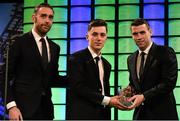 20 March 2016; Republic of Ireland's Lee O'Connor is presented with the 3 FAI Under 15 International Player of the Year award from Republic of Ireland Internationals Richard Keogh and Seamus Coleman. 3 FAI International Soccer Awards. RTE, Donnybrook, Dublin. Picture credit: David Maher / SPORTSFILE