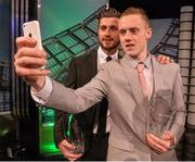20 March 2016; Jimmy Carr, St. Michael's FC, winner of the 3 FAI Junior International Player of the Year award, takes a 'selfie' with Republic of Ireland's Shane Long, winner of the 3 FAI Senior International goal of the year award. 3 FAI International Soccer Awards. RTE, Donnybrook, Dublin. Picture credit: David Maher / SPORTSFILE