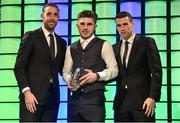 20 March 2016; Republic of Ireland's Ryan Manning, is presented with the 3 FAI Under 19 International Player of the Year award by Republic of Ireland International's Richard Keogh and Seamus Coleman . 3 FAI International Soccer Awards. RTE, Donnybrook, Dublin. Picture credit: David Maher / SPORTSFILE