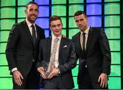 20 March 2016; Republic of Ireland's Conor Ronan is presented with the 3 FAI Under 17 International Player of the Year award from Republic of Ireland International's Richard Keogh and Seamus Coleman. 3 FAI International Soccer Awards. RTE, Donnybrook, Dublin. Picture credit: David Maher / SPORTSFILE