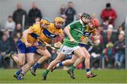 20 March 2016; Graeme Mulcahy, Limerick, in action against Oisin O'Brien, Cian Dillon and Paul Flanagan, Clare. Allianz Hurling League, Division 1B, Round 5, Clare v Limerick. Cusack Park, Ennis, Co. Clare. Picture credit: Diarmuid Greene / SPORTSFILE