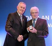 16 March 2009; Tommy McLoughlin, Wolfe Tones GAA Club, Co. Longford, is presented with a GAA President's Award by Uachtarán CLG Criostóir Ó Cuana. Tommy became Club Secretary in 1969 through until 1976. During his term, he oversaw the development of the Club’s pitch and dressing rooms. He also resumed his previous role as county board delegate, which is a position he holds to this day. GAA President’s Awards 2010, Croke Park, Dublin. Picture credit: Brendan Moran / SPORTSFILE