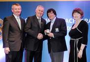 16 March 2009; Charlie McAlester, Newtown Blues GAA Club, Co. Louth, is presented with a GAA President's Award by Uachtarán CLG Criostóir Ó Cuana, in the company of Pol O Gallcjhoir, TG4 and Joanne Lee, Head of Internal Cummunications, AIB. For 39 years, Charlie had seen to it that Louth County teams of all levels were togged out to the very best standards. His standing in the world of the GAA has been perfectly demonstrated over the past 11 months during his battle with serious illness. It was with regret that Charlie had to give up his job as Louth kitman but his interest in Wee County teams remains strong. GAA President’s Awards 2010, Croke Park, Dublin. Picture credit: Brendan Moran / SPORTSFILE