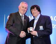 16 March 2009; Charlie McAlester, Newtown Blues GAA Club, Co. Louth, is presented with a GAA President's Award by Uachtarán CLG Criostóir Ó Cuana. For 39 years, Charlie had seen to it that Louth County teams of all levels were togged out to the very best standards. His standing in the world of the GAA has been perfectly demonstrated over the past 11 months during his battle with serious illness. It was with regret that Charlie had to give up his job as Louth kitman but his interest in Wee County teams remains strong. GAA President’s Awards 2010, Croke Park, Dublin. Picture credit: Brendan Moran / SPORTSFILE