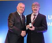 16 March 2009; Seán Clarke, Beragh Red Knight’s GAA Club, Co. Tyrone, is presented with a GAA President's Award by Uachtarán CLG Criostóir Ó Cuana. Séan was the pivotal figure in the amalgamation of the Handball Club into the Beragh Red Knights GAC in 2004. Part of that project has included the building of a state-of-the-art 40x20 handball court within the Club’s pavilion. GAA President’s Awards 2010, Croke Park, Dublin. Picture credit: Brendan Moran / SPORTSFILE
