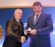 16 March 2009; John Hughes, Geevagh GAA Club, Co. Sligo, is presented with a GAA President's Award by Uachtarán CLG Criostóir Ó Cuana. For many years in Sligo, John Hughes has become renowned for his work in his home parish of Geevagh and the Cumann na mBunscol organisation in Sligo. He has been come to be known as ‘Mr. Cumann na mBunscol’ in the county. GAA President’s Awards 2010, Croke Park, Dublin. Picture credit: Brendan Moran / SPORTSFILE