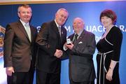 17 March 2009; Harry Mc Evoy, Carryduff GAC, Down, is presented with a GAA President's Award by Uachtarán CLG Criostóir Ó Cuana, in the company of Pol O Gallchoir, Ceannsai, TG4, and Joanne Lee, Head of Internal Cummunications, AIB. Harry was a founder member of Dumaness and Carryduff and also served as Secretary and Chairman of the East Down Divisional Committee. He has been deeply involved in the promotion and presentation of Scór at the county, provincial and central level. GAA President’s Awards 2010, Croke Park, Dublin. Picture credit: Brendan Moran / SPORTSFILE