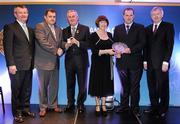 16 March 2009; Eamonn O'Neill, left, Chairman of the 125 Committee in Ballylanders GAA Club, Co. Limerick, and Pa Meade, 2nd from right, Chairman of the Ballylanders GAA Club, Co. Limerick, receive a special GAA President's Award from Uachtarán CLG Criostóir Ó Cuana and Joanne Lee, Head of Internal Cummunications, AIB, in the company of Pol O Gallchoir, left, Ceannsai, TG4, and Páraic Duffy, Ard Stiúrthóir of the GAA. Ballylanders Shamrocks, as the Club was then known, was founded in 1886. The Club’s 125 Anniversary celebrations focused of the enormous contribution made by the founder of the club, Frank B Dineen, in the emergence of the GAA. He is the only man to serve as both Secretary and President of the Association, and bought the site on Jones’s Road where Croke Park now stands. GAA President’s Awards 2010, Croke Park, Dublin. Picture credit: Brendan Moran / SPORTSFILE