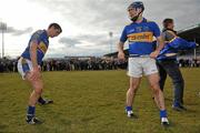 14 March 2010; Tipperary's Eoin Kelly and Seamus Callanan, left, warm down as a crowd of onlookers gather. Allianz GAA Hurling National League, Division 1, Round 3, Tipperary v Galway, Semple Stadium, Thurles, Co. Tipperary. Picture credit: Brian Lawless / SPORTSFILE