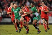 18 March 2010; Scott Deasy, Munster, is tackled by Joe Ajuwa, Scarlets. Celtic League, Munster v Scarlets, Musgrave Park, Cork. Picture credit: Matt Browne / SPORTSFILE