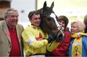 18 March 2016; Jack Sherwood with winning owners John and Pat Hales in the parade ring after winning the Martin Pipe Conditional Jockeys' Handicap Hurdle on Ibis Du Rheu. Prestbury Park, Cheltenham, Gloucestershire, England. Picture credit: Cody Glenn / SPORTSFILE