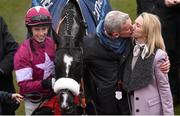 18 March 2016; Jockey Bryan Cooper with Don Cossack as owners Michael O'Leary and Anita O'Leary kiss after winning the Timico Cheltenham Gold Cup. Prestbury Park, Cheltenham, Gloucestershire, England. Picture credit: Cody Glenn / SPORTSFILE