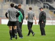 19 March 2010; Ireland head coach Declan Kidney keeps an eye on Gordon D'Arcy during the squad captain's run ahead of their RBS Six Nations Rugby Championship match against Scotland on Saturday. Croke Park, Dublin. Picture credit: Brendan Moran / SPORTSFILE
