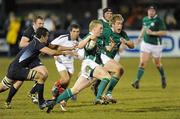 19 March 2010; Nevin Spence, Ireland, goes past the tackle of Stuart McInally, Scotland. U20 Six Nations Rugby Championship, Ireland v Scotland, Dubarry Park, Athlone, Co. Westmeath. Picture credit: Matt Browne / SPORTSFILE