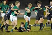 19 March 2010; Nevin Spence, Ireland, gets the ball away to team-mate Eoin Griffin while being tackled by Alun Walker, right, and Dougie Fife, Scotland. U20 Six Nations Rugby Championship, Ireland v Scotland, Dubarry Park, Athlone, Co. Westmeath. Picture credit: Matt Browne / SPORTSFILE