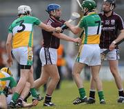 20 March 2010; Aidan Harte, Galway, gets to grips with David Kenny and Derek Morkan, Offaly. Allianz GAA National Hurling League, Division 1, Round 4, Galway v Offaly. Pearse Stadium, Galway. Picture credit: Ray Ryan / SPORTSFILE