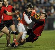 20 March 2010; Stefan Forker, Armagh, in action against Daniel McCartan, Down. Allianz GAA National Football League, Down v Armagh, Division 2, Round 5, Pairc Esler, Newry, Co. Down. Picture credit: Oliver McVeigh / SPORTSFILE