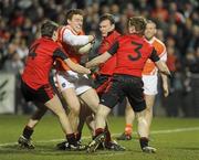 20 March 2010; Charlie Vernon, Armagh, in action against Damian Rafferty, Daniel McCartan, and Brendan McArdleDown. Allianz GAA National Football League, Down v Armagh, Division 2, Round 5, Pairc Esler, Newry, Co. Down. Picture credit: Oliver McVeigh / SPORTSFILE
