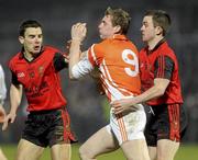 20 March 2010; Kieran Toner, Armagh, in action against Daniel Hughes and Mark Poland, Down. Allianz GAA National Football League, Down v Armagh, Division 2, Round 5, Pairc Esler, Newry, Co. Down. Picture credit: Oliver McVeigh / SPORTSFILE