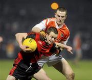 20 March 2010; Mark Poland, Down, in action against Brendan Donaghy, Armagh. Allianz GAA National Football League, Down v Armagh, Division 2, Round 5, Pairc Esler, Newry, Co. Down. Picture credit: Oliver McVeigh / SPORTSFILE