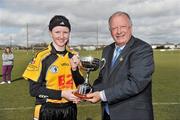 21 March 2010; Pat Quill, Uachtarán Cumann Peil Gael na mBan, presents NUI Maynooth captain Niamh O'Sullivan with the cup. Giles Cup Final, NUI Maynooth v Waterford IT, St Clare's, DCU, Ballymun, Dublin. Picture credit: Brian Lawless / SPORTSFILE