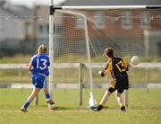 21 March 2010; Aine Kelly, Mary Immaculate College Limerick, beats Aisling Barrett, DCU 2, to score her side's third goal. Lynch Cup Final, DCU 2 v Mary Immaculate College, St Clare's, DCU, Ballymun, Dublin. Picture credit: David Maher / SPORTSFILE