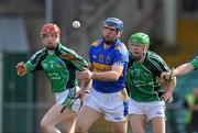 21 March 2010; Eoin Kelly, Tipperary, in action against Shane O'Neill, left, and Des Kenny, Limerick. Allianz GAA National Hurling League, Division 1, Round 4, Limerick v Tipperary, Gaelic Grounds, Limerick. Picture credit: Diarmuid Greene / SPORTSFILE