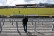 21 March 2010; A lone supporter on the terrace to watch the game. Allianz GAA National Hurling League, Division 1, Round 4, Antrim v Clare, Casement Park, Belfast, Co. Antrim. Picture credit: Oliver McVeigh / SPORTSFILE