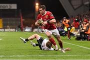 25 March 2016; Ronan O'Mahony, Munster, goes past Giulio Toniolatti, Zebre, before scoring the second try. Guinness PRO12 Round 18, Munster v Zebre. Thomond Park, Limerick. Picture credit: Matt Browne / SPORTSFILE