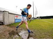 26 March 2016; Eoin Kananagh, Longford, hops over a puddle as he makes his way out onto the pitch before the start of the match. Allianz Hurling League Division 3A Final, Fermanagh v Longford, Markievicz Park, Sligo. Picture credit: Seb Daly / SPORTSFILE