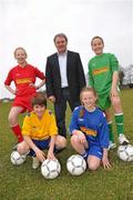 22 March 2010; Former Republic of Ireland international Ray Houghton with pupils from Gaelscoil na Rilte, Dunshaughlin, Co. Meath, are left to right, Jean Ni Chaomhanaigh,Tommy Cinsealach, Saoirse Patchell and Cormac O'Miachain, at the national launch of the Xtra-Vision FAI Schools 5-a-Side competition, Marino College, Marino, Dublin. Picture credit: David Maher / SPORTSFILE