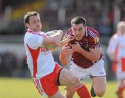 21 March 2010; Martin Penrose, Tyrone, in action against David Reilly, Galway. Allianz GAA National Football League, Division 1, Round 5, Galway v Tyrone. Pearse Stadium, Galway. Picture credit: Ray Ryan / SPORTSFILE