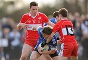 21 March 2010; Dessie Mone, Monaghan, in action against James Kielt, left and Raymond Wilkinson, Derry. Allianz GAA National Football League, Division 1, Round 5, Monaghan v Derry, St Mary's Park, Scotstown, Co. Monaghan. Photo by Sportsfile