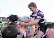 21 March 2010; Patrick Thornton, Terenure College, celebrates with supporters and team-mates after the game. Leinster Schools Junior Cup Final, St Michael's College v Terenure College, Donnybrook Stadium, Dublin. Picture credit: Pat Murphy / SPORTSFILE