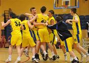 22 March 2010; Players from St. Louis Community School, celebrate at the end of the game after victory over Patrician High School. U16B Boys - All-Ireland Schools League Finals 2010, Patrician High School, Carrickmacross v St. Louis Community School, Kiltimagh, Mayo, National Basketball Arena, Tallaght, Dublin. Picture credit: David Maher / SPORTSFILE