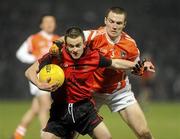 20 March 2010; Mark Poland, Down, in action against Brendan Donaghy, Armagh. Allianz National Football League, Down v Armagh, Division 2, Round 5, Pairc Esler, Newry, Co. Down. Picture credit: Oliver McVeigh / SPORTSFILE