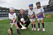 23 March 2010; Dublin hurling manager Anthony Daly with Michael Donovan, left, Laura Byrne and Sarah O'Neill, at the launch of the 2010 Vhi GAA Cúl Camps. Croke Park, Dublin. Picture credit: Brian Lawless / SPORTSFILE