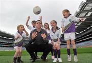 23 March 2010; Kildare football manager Kieran McGeeney with Michael Donovan, left, Luke Browne, Sarah O'Neill, Laura Byrne and Johanne Byrne, right, at the launch of the 2010 Vhi GAA Cúl Camps. Croke Park, Dublin. Picture credit: Brian Lawless / SPORTSFILE