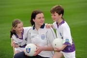 23 March 2010; Dublin footballer Cliodhna O'Connor with  Laura Byrne and Luke Browne at the launch of the 2010 Vhi GAA Cúl Camps. Croke Park, Dublin. Picture credit: Ray McManus / SPORTSFILE