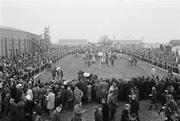 28 December 1970; Punters gather around the parade ring before the race. Sweeps Hurdle, Fairyhouse, Co. Meath. Picture credit: Connolly Collection / SPORTSFILE