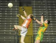 24 March 2010; Gary McCoey, Armagh, in action against Michael Murphy, Donegal. Cadbury Ulster GAA Football Under 21 Quarter-Final, Armagh v Donegal, Brewster Park, Enniskillen, Co. Fermanagh. Picture credit: Oliver McVeigh / SPORTSFILE