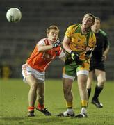 24 March 2010; Dermot Molloy, Donegal, in action against Mark McConville, Armagh. Cadbury Ulster GAA Football Under 21 Quarter-Final, Armagh v Donegal, Brewster Park, Enniskillen, Co. Fermanagh. Picture credit: Oliver McVeigh / SPORTSFILE